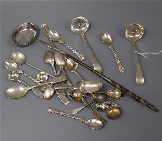 A group of small silver flatware including a Georgian toddy/cream ladle and a white metal toddy ladle with baleen handle.